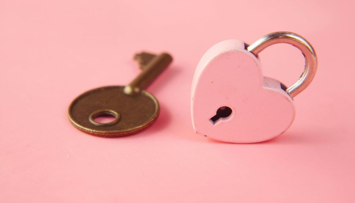A key with a heart-shaped lock, symbolizing self-love, empowerment, and thriving as a single individual.