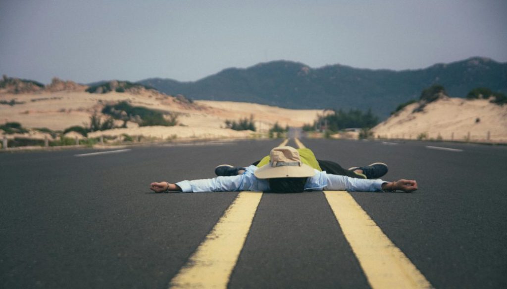 The contrast in stillness and the business and loudness of a roadway