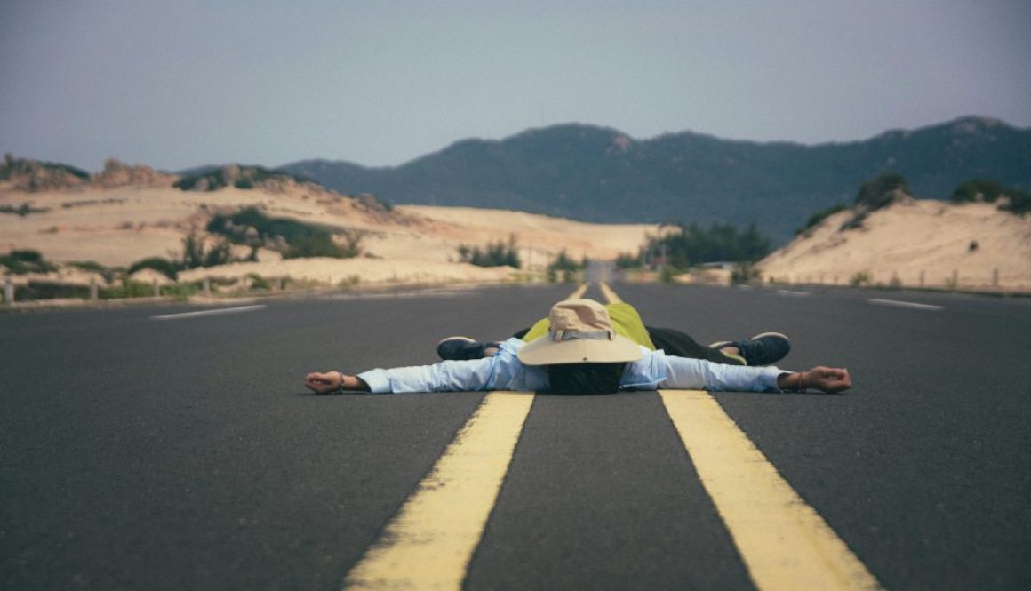 The contrast in stillness and the business and loudness of a roadway