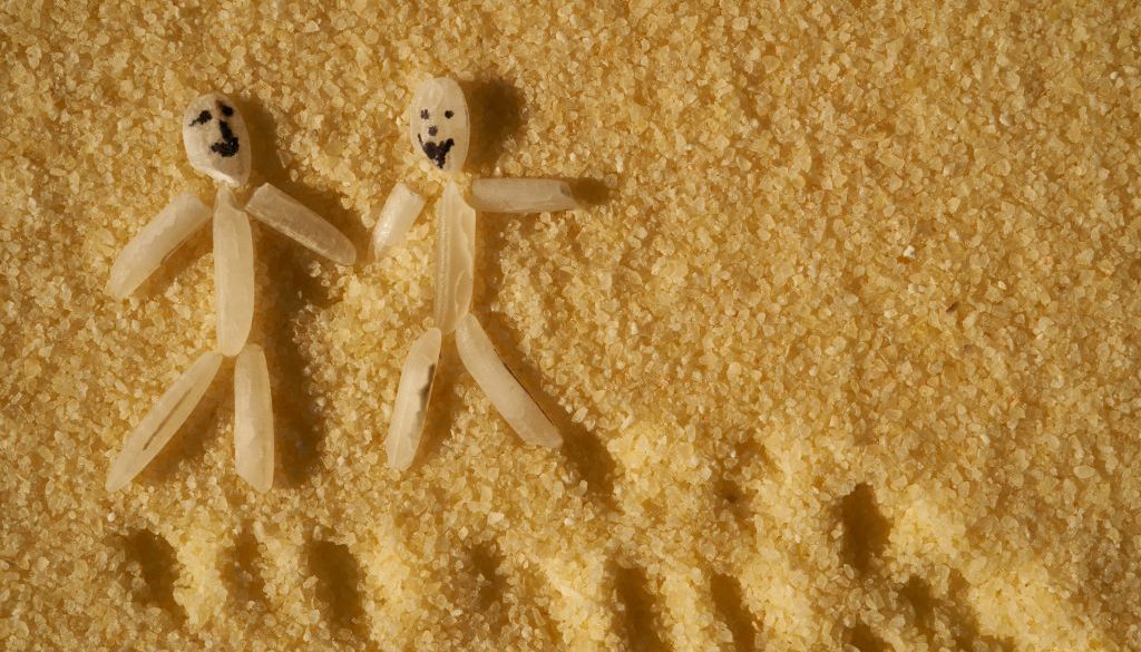 Two hands reaching out to each other, representing emotional support and trust in relationships.